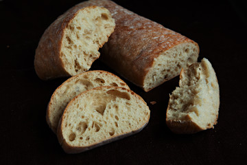 Fresh sliced italian Ciabatta bread on background