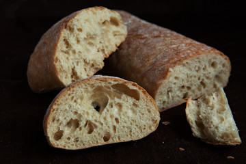 Fresh sliced italian Ciabatta bread on background