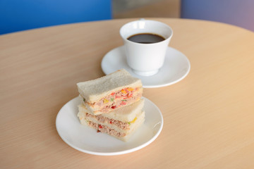 Tuna sandwich with hot coffee
