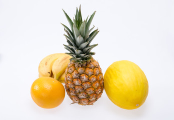 Assortment of fresh exotic fruits isolated on white