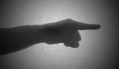 Silhouette behind a transparent paper