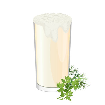 Glass of ayran with dill and parsley herbs isolated on white.
