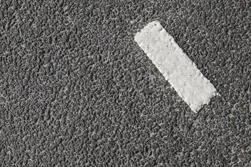 Fototapeta premium White stripe on dark gray asphalt