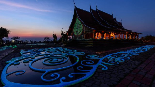 Timelapse of Unidentified traveler walking at the art ground in thai temple