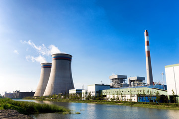 Fototapeta premium constructions inb modern power plant near river