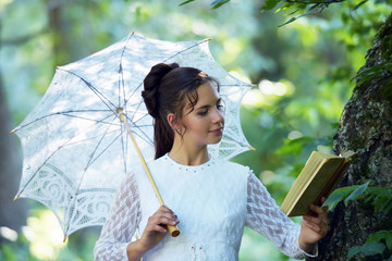 Girl with a filigree umbrella