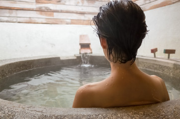 woman at hot spring pool