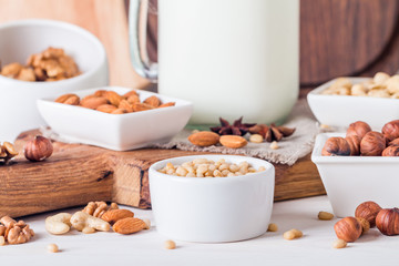 Vegan milk from nuts in glass jar 