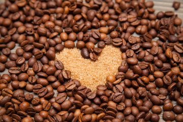 Coffee beans around the heart