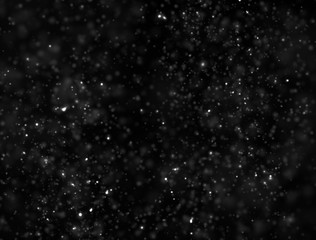 Abstract White Glitter Explosion on Black Background
