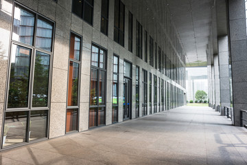 empty footpath and modern building in modern city