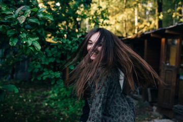 The smiling girl in a kitchen garden