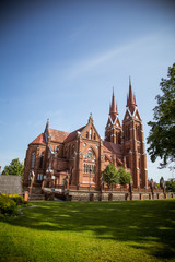 Fototapeta na wymiar A beautiful red brick church in Lithuania