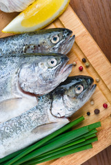 Fresh raw fish trout with lemon