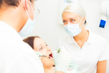 Naklejka na ściany i meble Young Woman At The Dentist