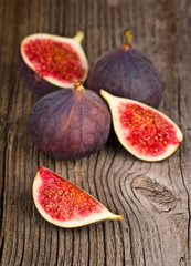 Ripe figs on rustic background