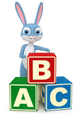 Cheerful rabbit isolated on a white background with alphabet cubes. 3d render illustration.