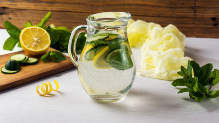 Water detox with fresh cucumber and lemon. Healthy drink