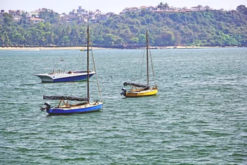 Fotobehang Morning scene of three boats anchored in outer sea in Dona Paula in Goa, India © JoseMathew