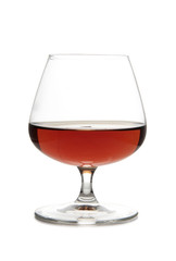 Glass with brandy and whiskey on white background