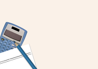 Business still life. A calculator, pencil and notebook, isolated on a light background