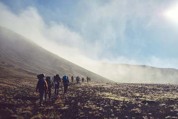 hikers on the trail in the Islandic mountains. Trek in National Park Landmannalaugar, Iceland....