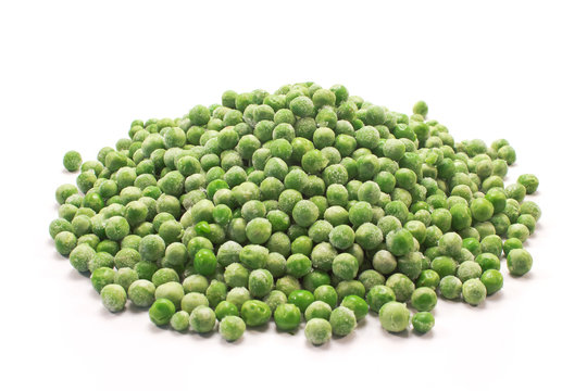 Frozen peas heap isolated on white background