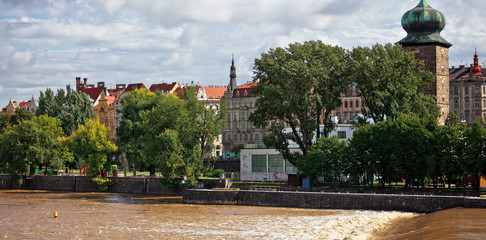View of the embankment and Shitkov water tower in Prague, Czech Republic.