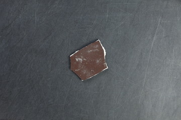 The cracked and broken piece of concrete wall represent the construction material concept related idea.