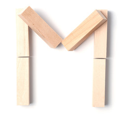 Alphabetic letter M, from wooden blocks