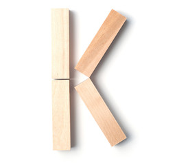 Alphabetic letter K, from wooden blocks