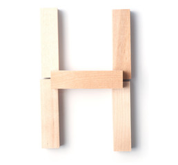 Alphabetic letter H, from wooden blocks