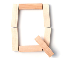 Alphabetic letter Q, from wooden blocks