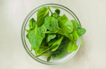 Healthy Spinach In Bowl On Table