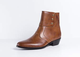 Male boot, leather chestnut on white background, isolated product.