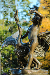 Bronze statue fountain Boy with Swan in the Wilanów Park, Warsaw