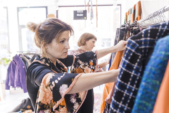 Two women in a second hand shop