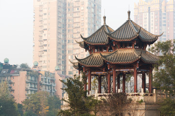 Naklejka premium Pagoda in Chengdu downtown in the fog - China