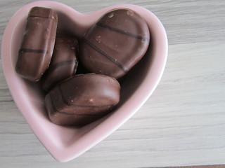 heart cake on a plate on a wooden floor 