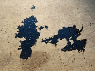 detail dirty oil on floor 