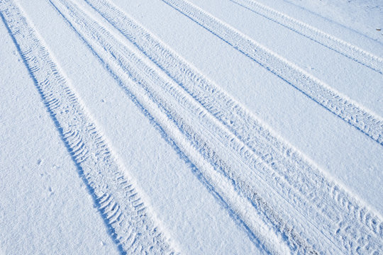traces of cars on the freshly fallen snow