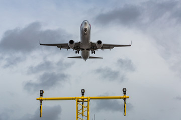 Obraz na płótnie Canvas An Aircraft landing on final approach Gatwick London UK