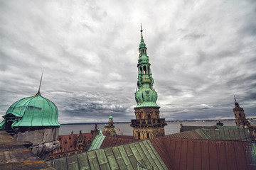 Obraz premium Tower of Kronborg castle and view of harbor
