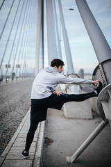 Young man exercise in urban environment
