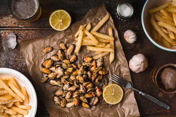 Traditional Belgian snack for beer on the metal background top view