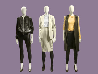 Three full-length female mannequins