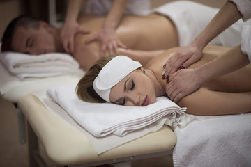 couple receiving a back massage