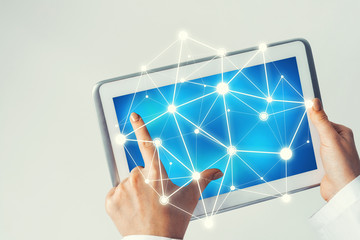 Close of female doctor hands working with tablet pc computer