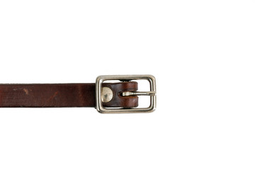 Buckle on a leather strap with white backgrounf.