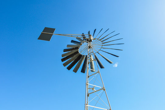 Close up of a metal windmill